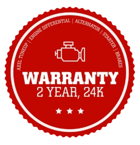 Two-year, 24,000-mile warranty seal with automotive component icons.